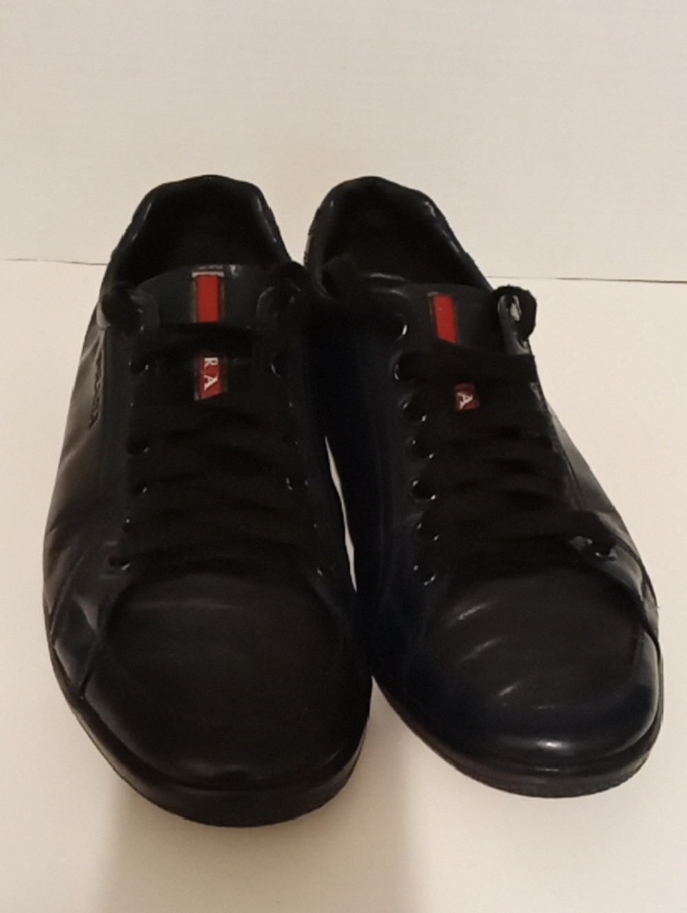 Prada Men’s Black Leather Sneakers with Red Accent Men's Size 7